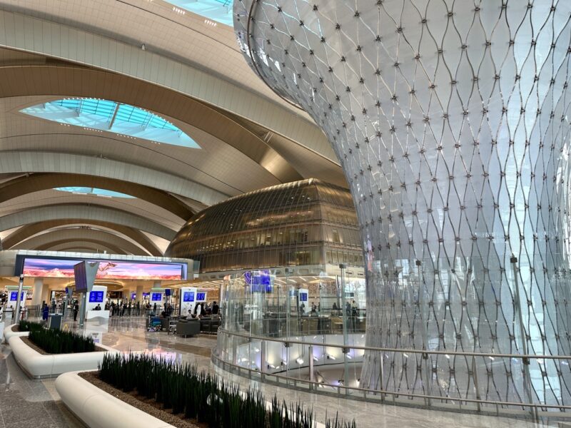 a large glass structure in a building