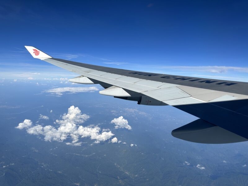 an airplane wing in the sky