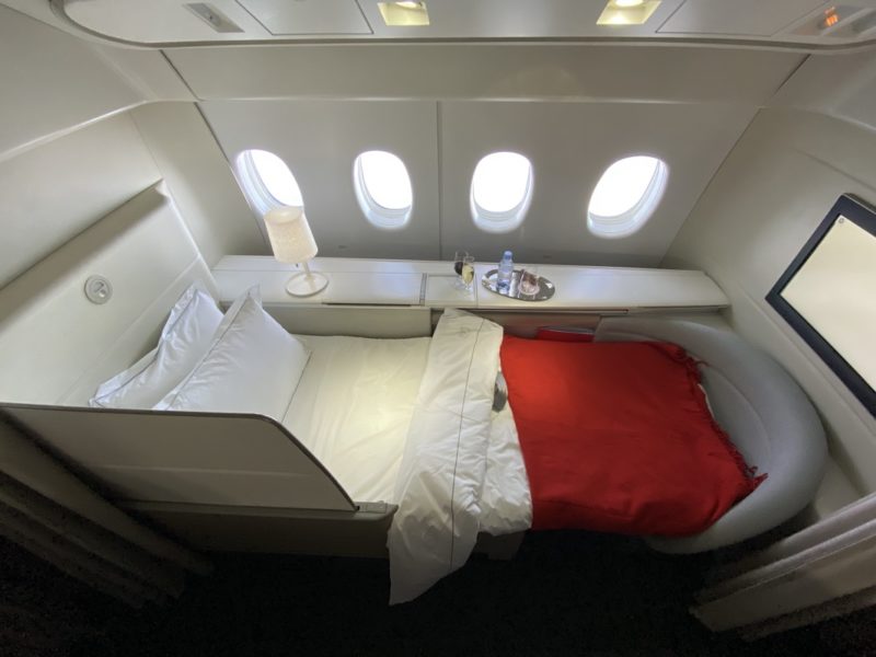 a bed in a plane