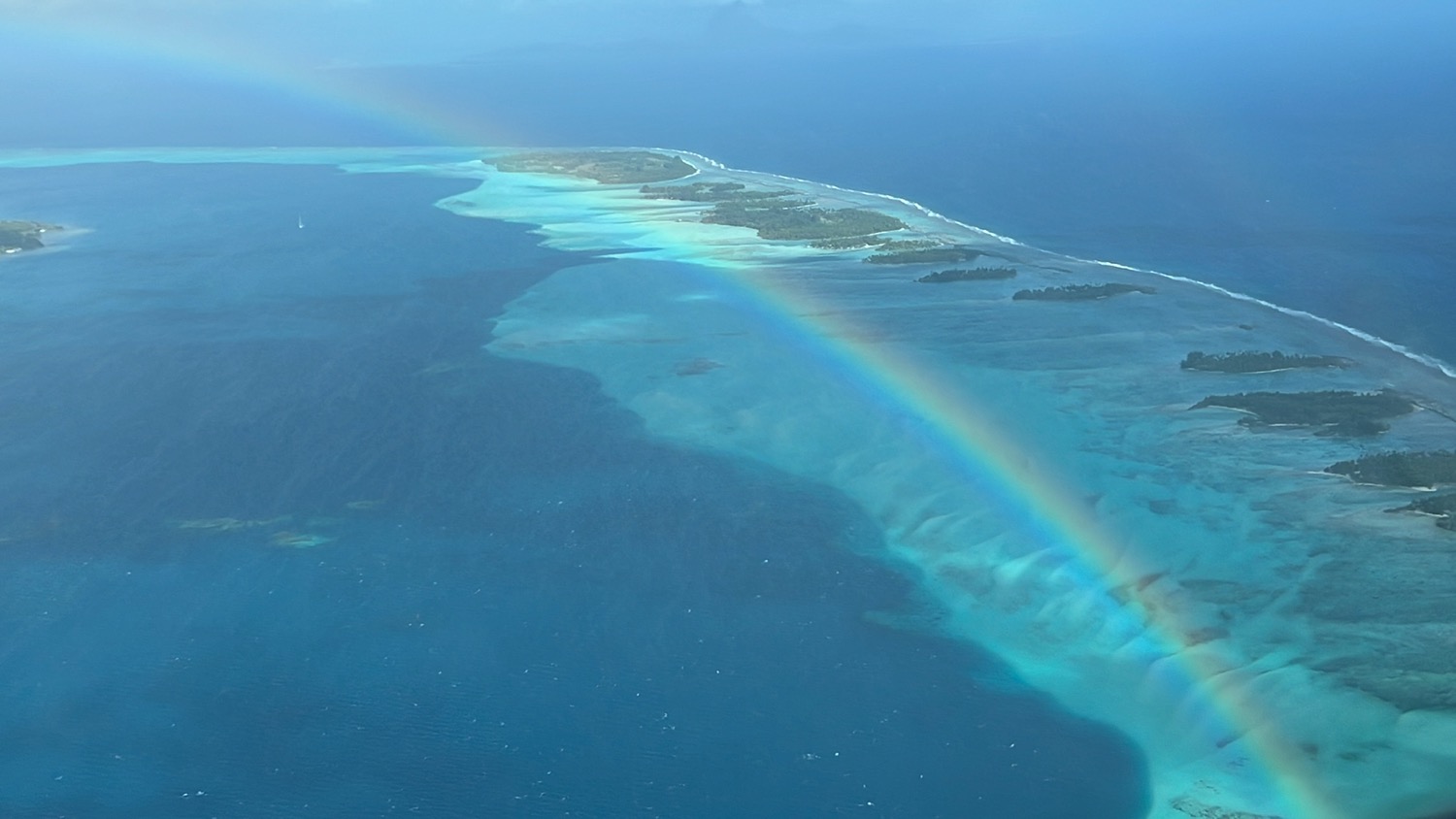 a rainbow over a beach