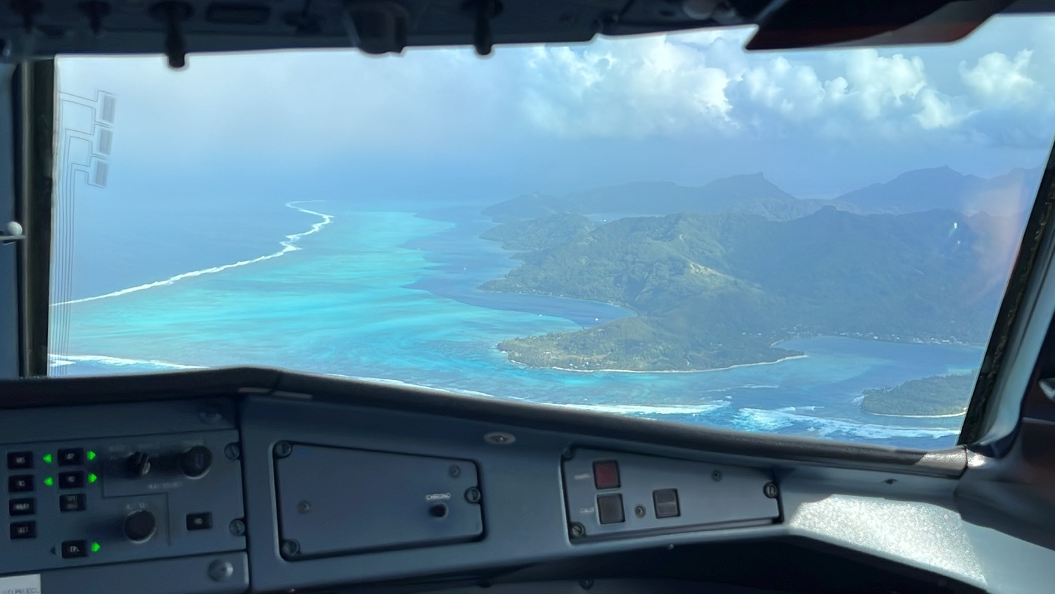 an aerial view of a land and ocean