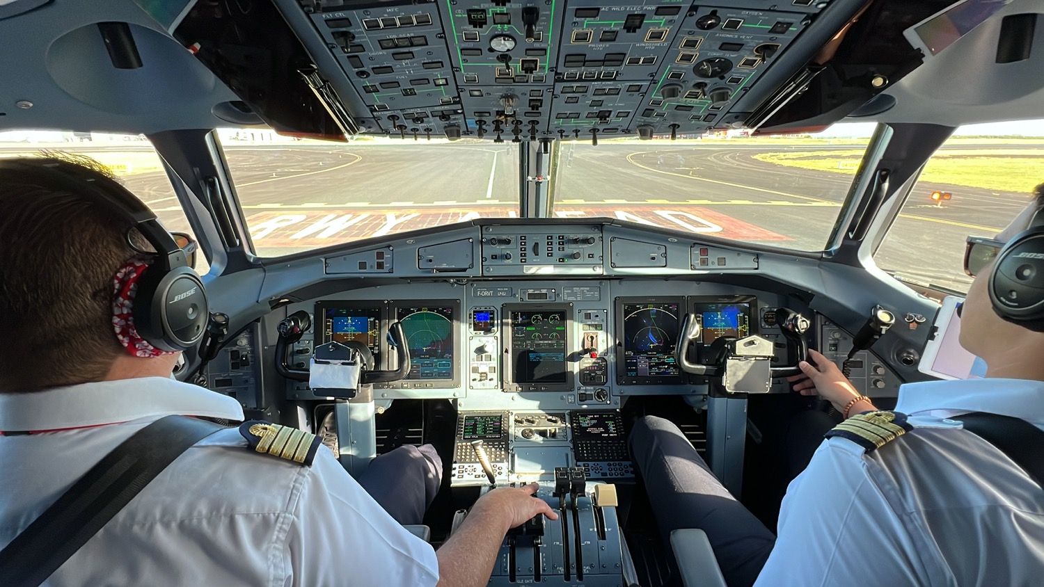 a group of pilots in a cockpit