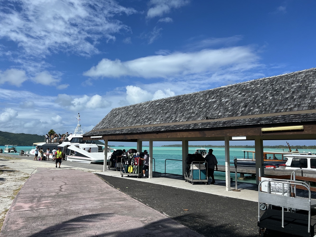 a dock with people walking by it