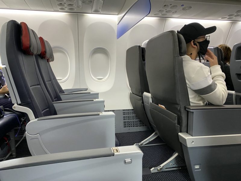 a man sitting in an airplane