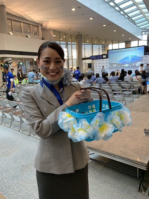 a woman holding a basket