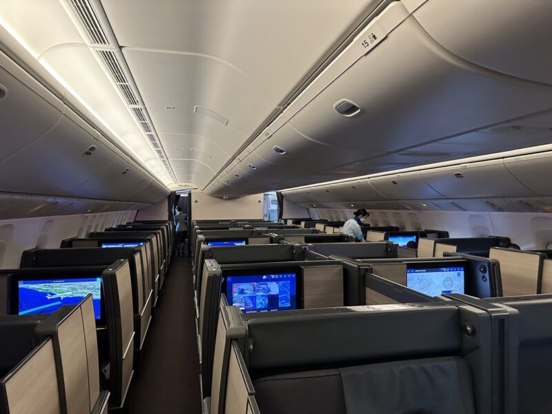 an airplane with rows of monitors