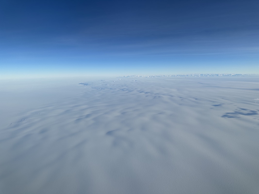 a aerial view of a snowy landscape