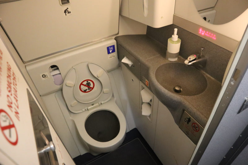 a toilet and sink in a plane