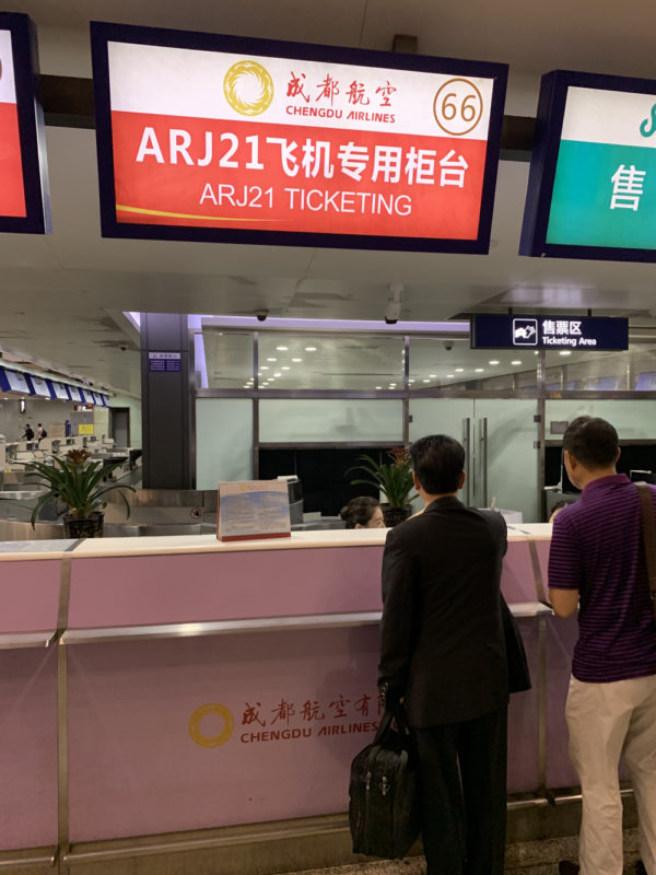 people standing in front of a counter