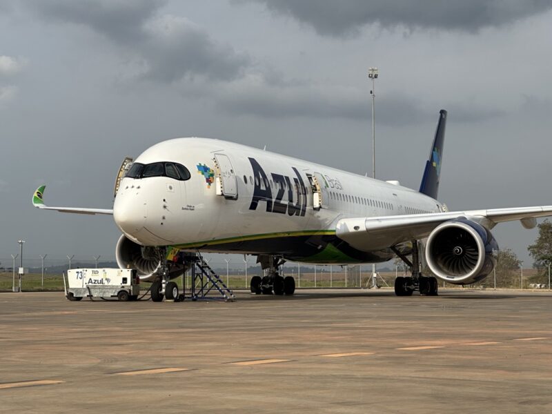 a large white airplane on a runway