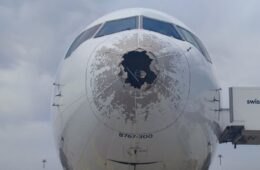 the front of a plane with a hole in it