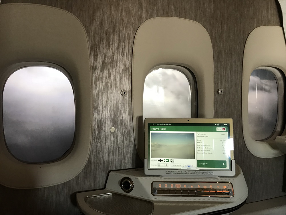 a laptop on a table with windows