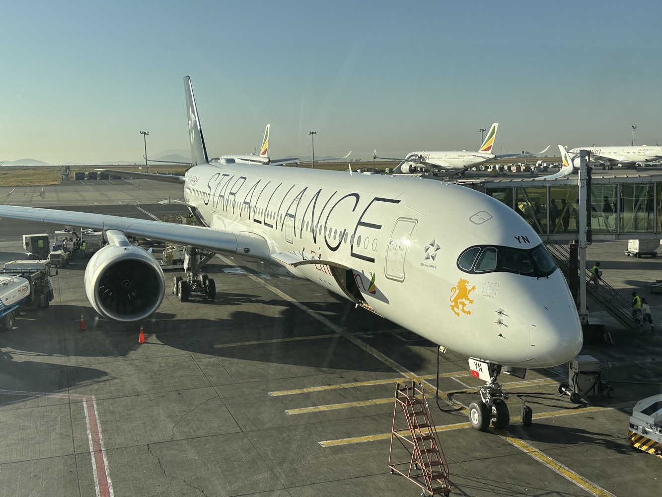 a large white airplane at an airport