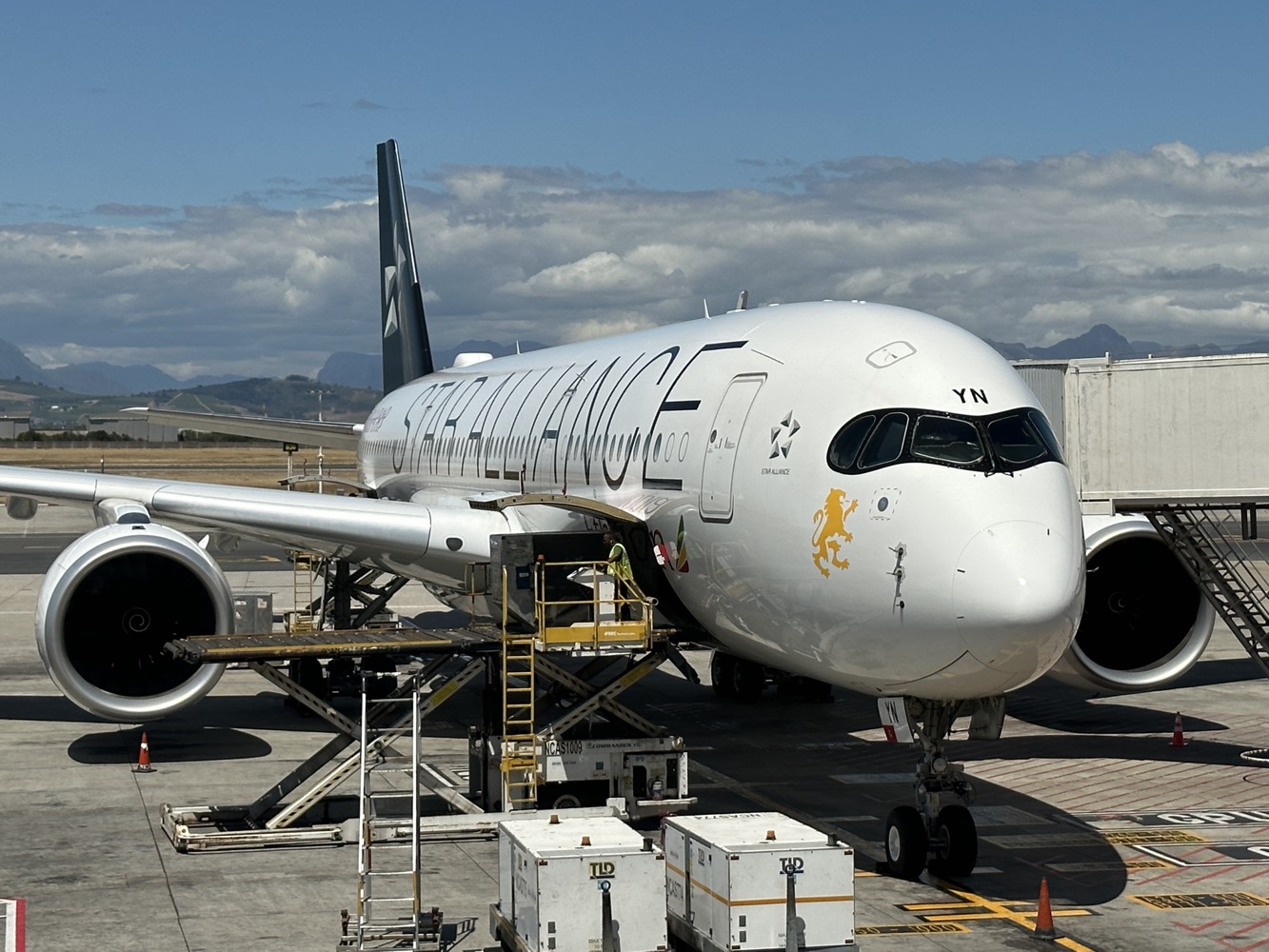 a large white airplane at an airport