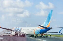 a large airplane parked on a runway