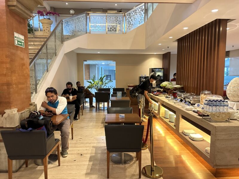 a group of people sitting in a restaurant