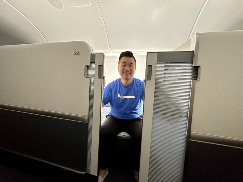 a man sitting in an airplane seat