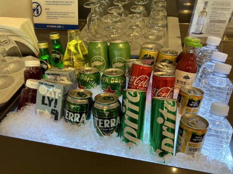 a group of cans and cans on ice