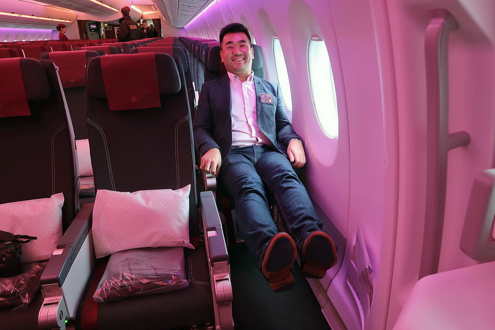 a man sitting in an airplane