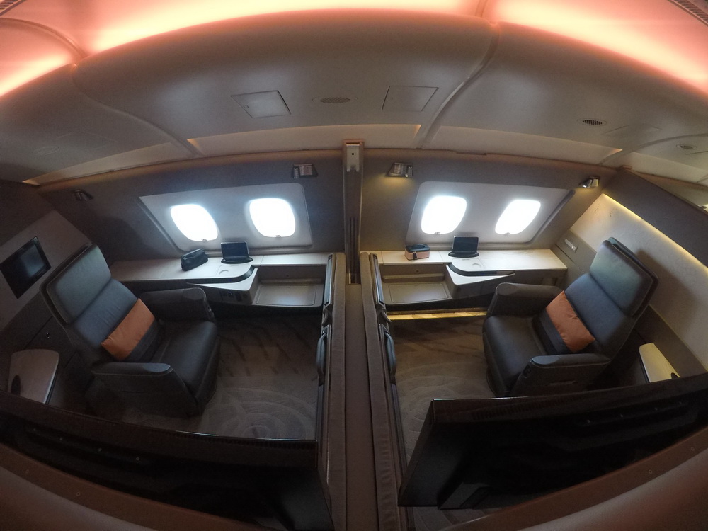 Photo of Singapore Airlines New First Class Suite with bed retracted