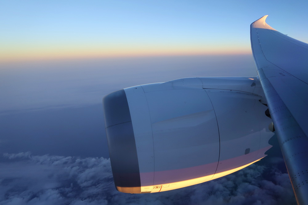 a plane's engine in the sky