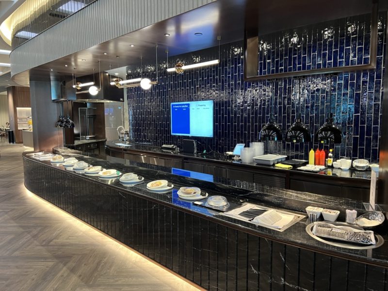 a restaurant with a black counter