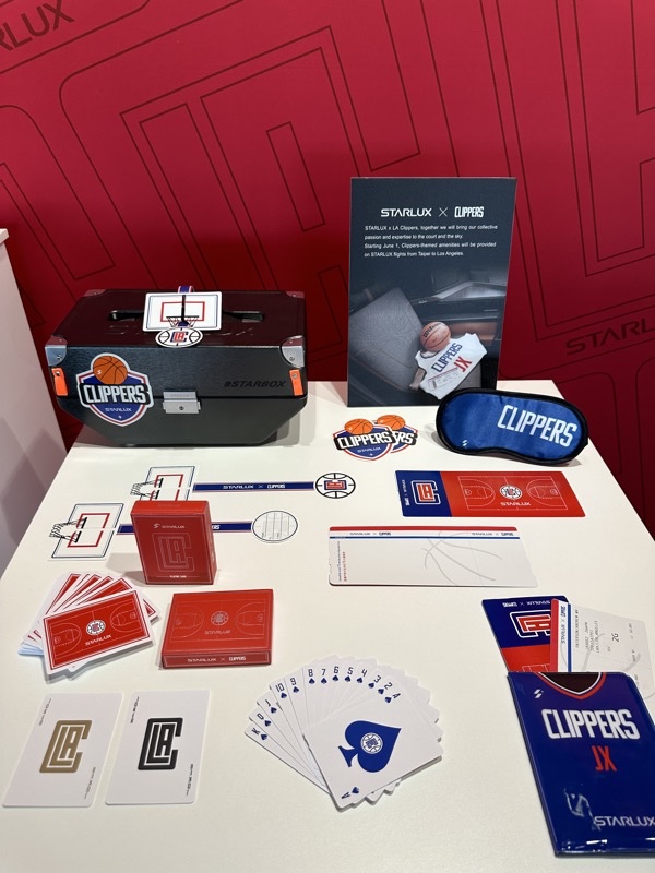 a table with a box and cards and a book