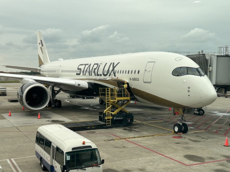 a white airplane on a tarmac