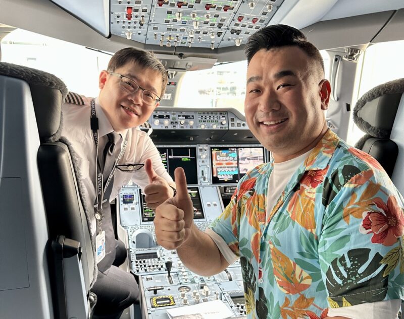 two men in a cockpit