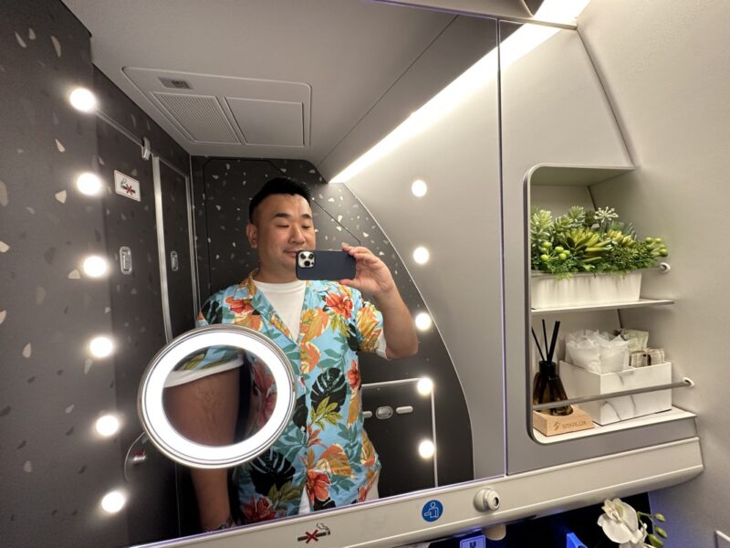 a man taking a selfie in a mirror