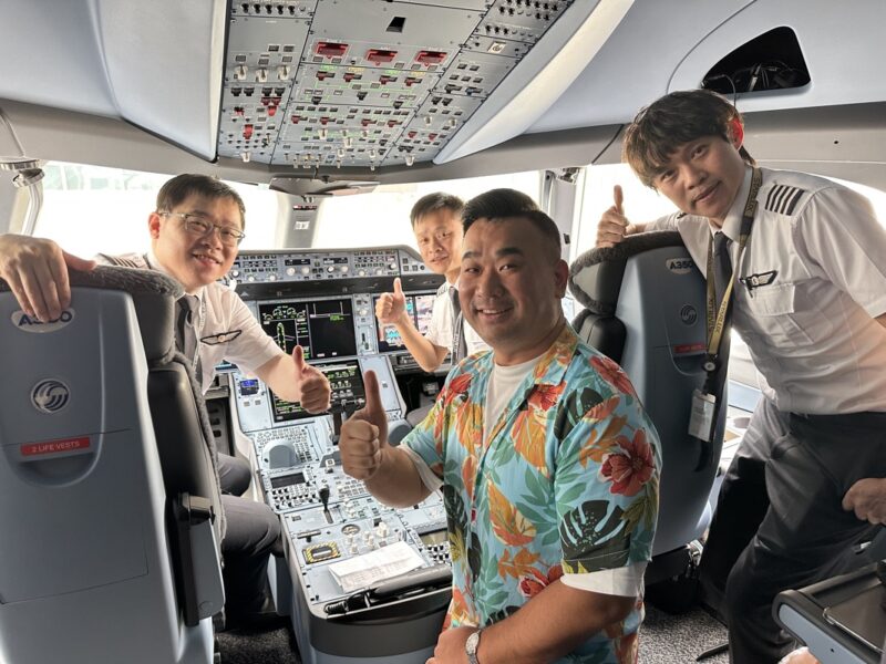 a group of men in a cockpit