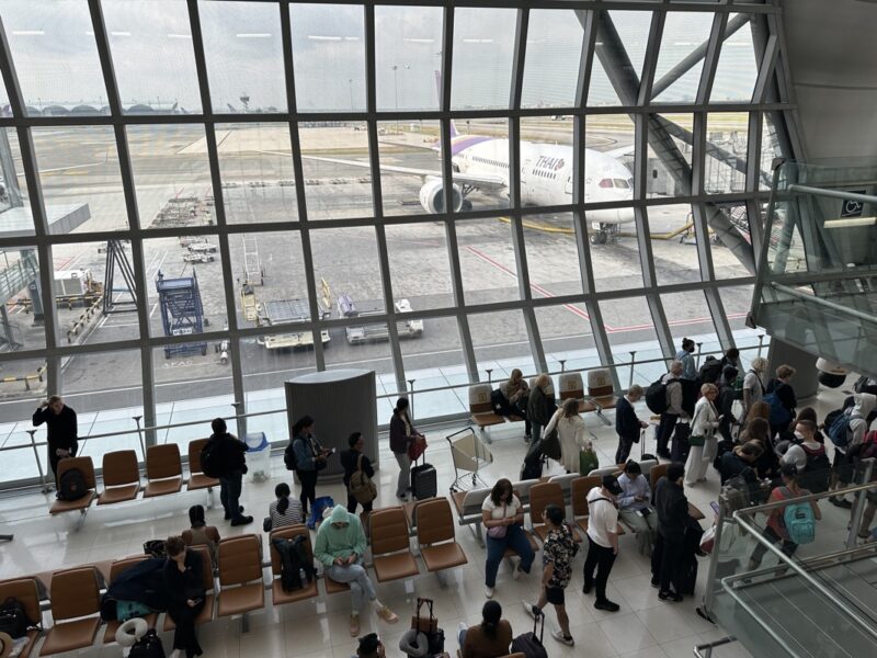 a group of people in an airport