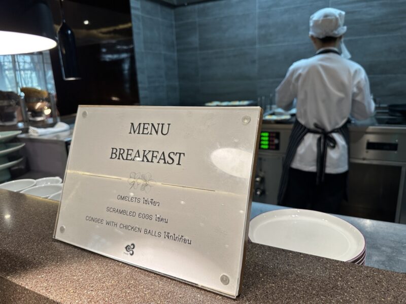 a menu sign on a counter