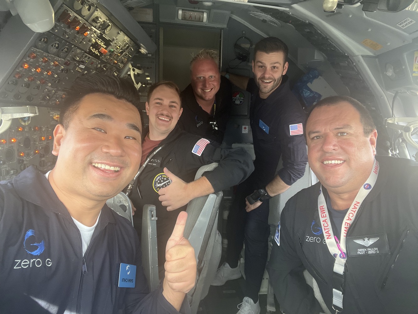 a group of men in a space shuttle