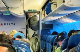 a group of people sitting in an airplane